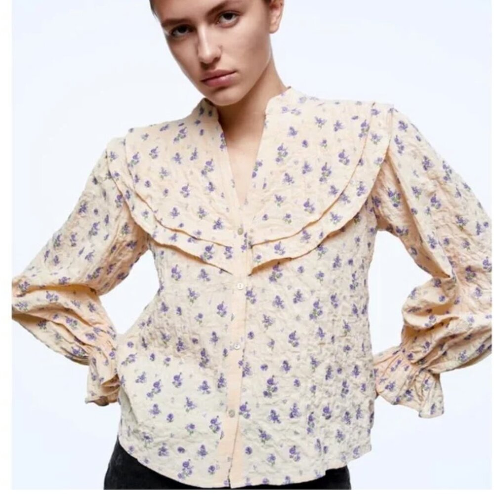 Zara ruffles floral blouse featuring a cream base Size S NWT